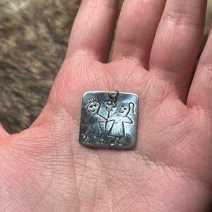 Vintage sterling silver Mexican Taxco children with flower pendant